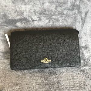 SOLD Coach fold over crossbody clutch black